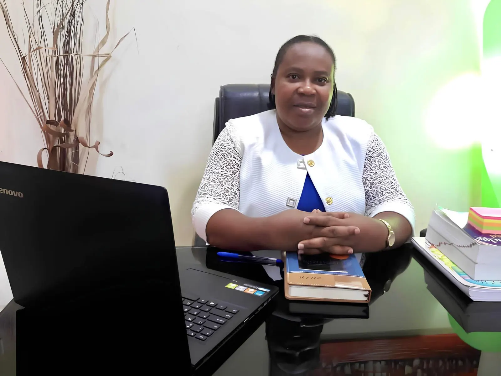 Mrs. Christianah Edem, Founder & Head of School, seated at her desk